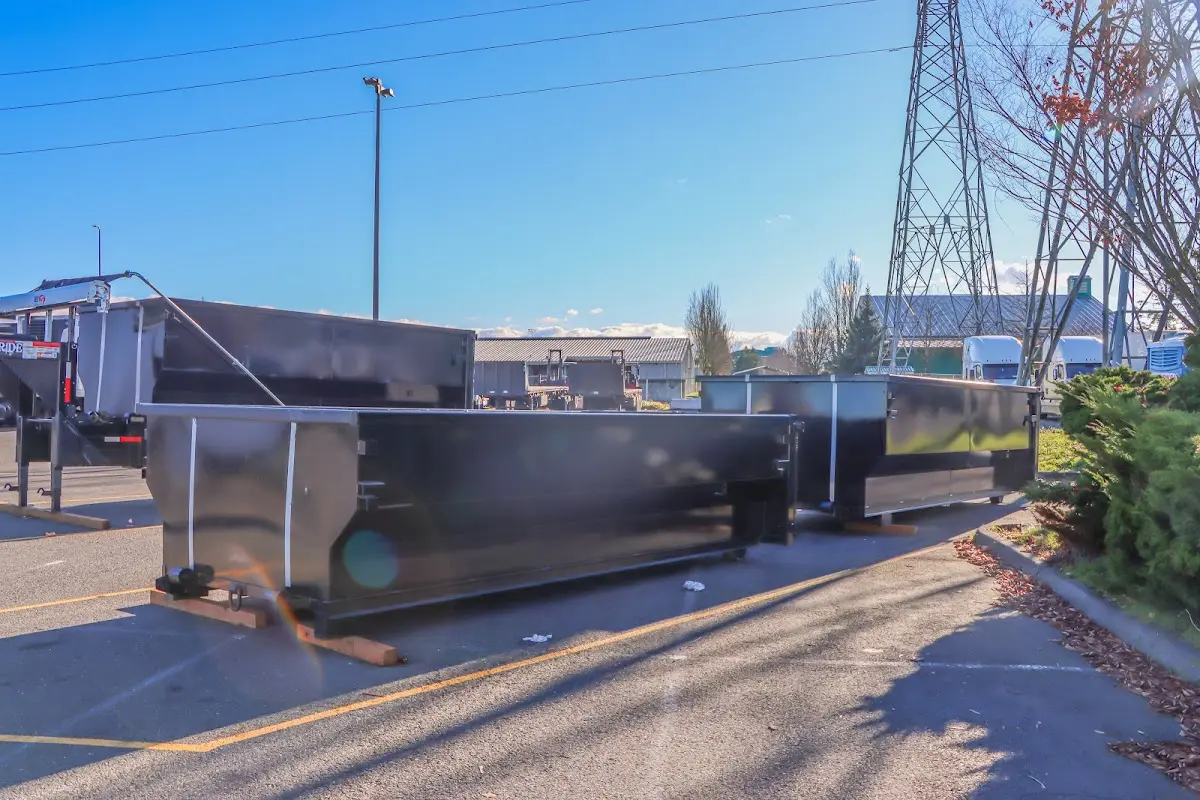 Roll-off dumpster ready for waste disposal at job site for Roofing Dumpster Rental in Essex